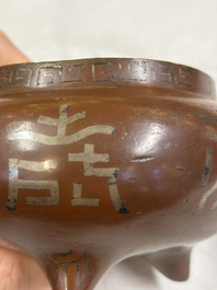 A Chinese or Vietnamese silver-inlaid bronze 'Fu Lu Shou' tripod censer,  Xuande mark, 19th C.