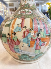 A Chinese Canton famille rose covered bottle vase and a teapot, 19th C.