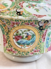 A Chinese Canton famille rose covered bottle vase and a teapot, 19th C.
