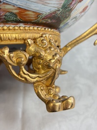 A Chinese Canton famille rose reticulated basket on stand and a gilt-bronze-mounted bowl, 19th C.