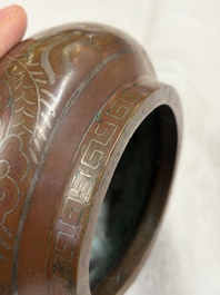 A Chinese or Vietnamese silver-inlaid bronze 'Fu Lu Shou' tripod censer,  Xuande mark, 19th C.
