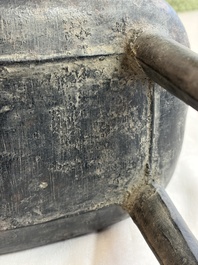 An inscribed Chinese archaic bronze food vessel and cover with double-dragon design, 'Yu Fang Ding 圉方鼎', Western Zhou