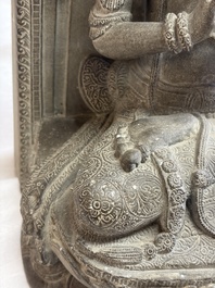 A Javanese carved stone figure of Prajnaparamita, 20th C.