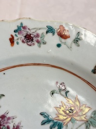 Eight Chinese famille rose plates with floral design and a 'Rooster' teapot, Yongzheng/Qianlong