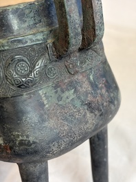 An inscribed Chinese archaic bronze food vessel and cover with double-dragon design, 'Yu Fang Ding 圉方鼎', Western Zhou