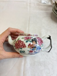 Eight Chinese famille rose plates with floral design and a 'Rooster' teapot, Yongzheng/Qianlong
