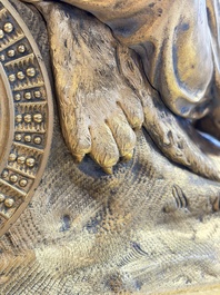 A gilt-bronze 'Oriental Beauty Reclining on a Lion Skin' mantel clock, France, first quarter 19th C.