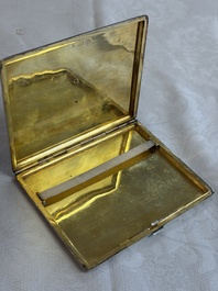 An Iranian silver and gilt cigarette case commemorating Mohammad Reza Pahlavi's coronation, 20th C.