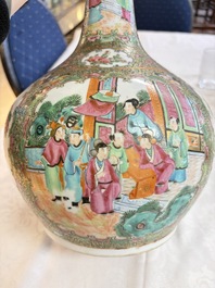 A Chinese Canton famille rose covered bottle vase and a teapot, 19th C.