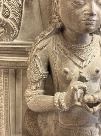 A Javanese carved stone figure of Prajnaparamita, 20th C.