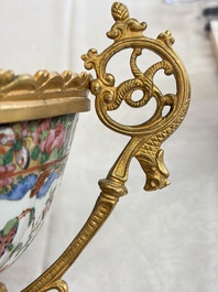 A Chinese Canton famille rose reticulated basket on stand and a gilt-bronze-mounted bowl, 19th C.