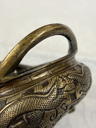 A Chinese bronze tripod 'Dragon' censer with two handles, Xuande mark, 19th C.