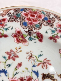 Eight Chinese famille rose plates with floral design and a 'Rooster' teapot, Yongzheng/Qianlong