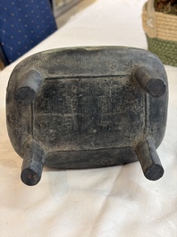 An inscribed Chinese archaic bronze food vessel and cover with double-dragon design, 'Yu Fang Ding 圉方鼎', Western Zhou