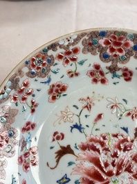 Eight Chinese famille rose plates with floral design and a 'Rooster' teapot, Yongzheng/Qianlong