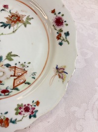 Eight Chinese famille rose plates with floral design and a 'Rooster' teapot, Yongzheng/Qianlong