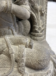 A Javanese carved stone figure of Prajnaparamita, 20th C.