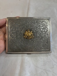 An Iranian silver and gilt cigarette case commemorating Mohammad Reza Pahlavi's coronation, 20th C.