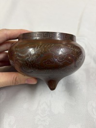 A Chinese or Vietnamese silver-inlaid bronze 'Fu Lu Shou' tripod censer,  Xuande mark, 19th C.