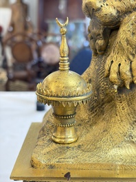 A gilt-bronze 'Oriental Beauty Reclining on a Lion Skin' mantel clock, France, first quarter 19th C.