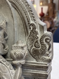 A Javanese carved stone figure of Prajnaparamita, 20th C.