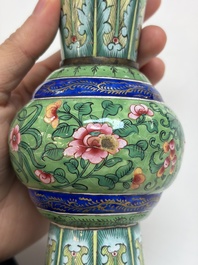 A Chinese Canton enamel green-ground three-piece altar set, 19th C.