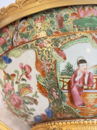 A Chinese Canton famille rose reticulated basket on stand and a gilt-bronze-mounted bowl, 19th C.