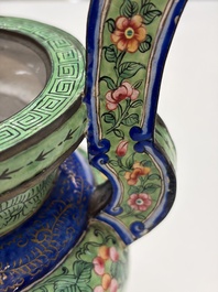 A Chinese Canton enamel green-ground three-piece altar set, 19th C.