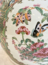 A Chinese Canton famille rose covered bottle vase and a teapot, 19th C.