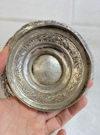 An Indian repouss&eacute; silver footed bowl, early 20th C.