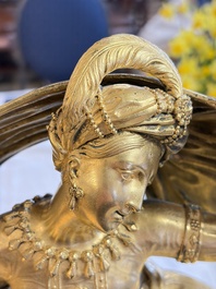 A gilt-bronze 'Oriental Beauty Reclining on a Lion Skin' mantel clock, France, first quarter 19th C.