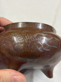 A Chinese or Vietnamese silver-inlaid bronze 'Fu Lu Shou' tripod censer,  Xuande mark, 19th C.
