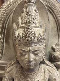 A Javanese carved stone figure of Prajnaparamita, 20th C.