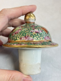 A Chinese Canton famille rose covered bottle vase and a teapot, 19th C.