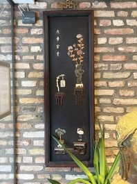 A Chinese lacquered wooden table screen with jade and cloisonn&eacute;, and a pair of wall panels embellished with jade, bone, and wood, 19/20th C.