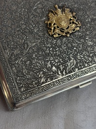 An Iranian silver and gilt cigarette case commemorating Mohammad Reza Pahlavi's coronation, 20th C.