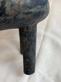 An inscribed Chinese archaic bronze food vessel and cover with double-dragon design, 'Yu Fang Ding 圉方鼎', Western Zhou