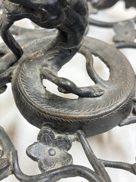 A large Chinese archaistic bronze 'Dragon' stand, Ming