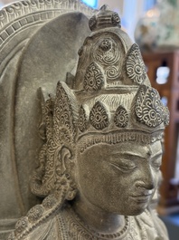 A Javanese carved stone figure of Prajnaparamita, 20th C.