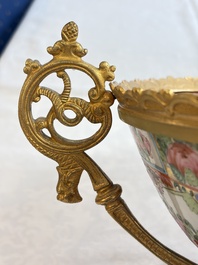 A Chinese Canton famille rose reticulated basket on stand and a gilt-bronze-mounted bowl, 19th C.