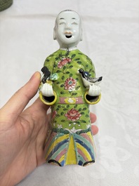 Six Chinese famille rose figures, one with a 'Lotus Throne' stand, 19th C.