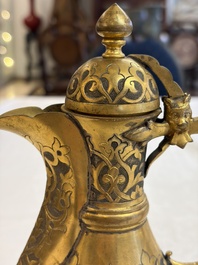 An Ottoman gilt-metal jug with stylised floral design, 19/20th C.
