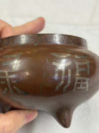 A Chinese or Vietnamese silver-inlaid bronze 'Fu Lu Shou' tripod censer,  Xuande mark, 19th C.