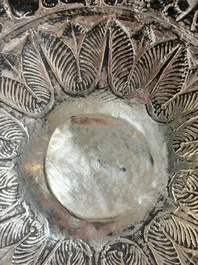 An Indian repouss&eacute; silver footed bowl, early 20th C.