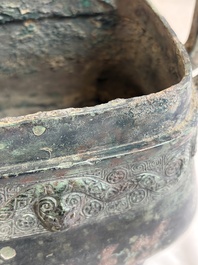 An inscribed Chinese archaic bronze food vessel and cover with double-dragon design, 'Yu Fang Ding 圉方鼎', Western Zhou
