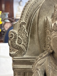 A Javanese carved stone figure of Prajnaparamita, 20th C.