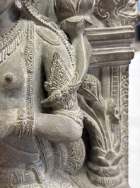 A Javanese carved stone figure of Prajnaparamita, 20th C.