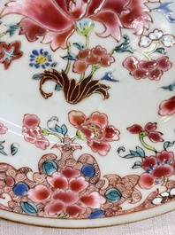 Eight Chinese famille rose plates with floral design and a 'Rooster' teapot, Yongzheng/Qianlong