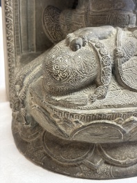 A Javanese carved stone figure of Prajnaparamita, 20th C.
