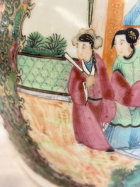 A Chinese Canton famille rose covered bottle vase and a teapot, 19th C.